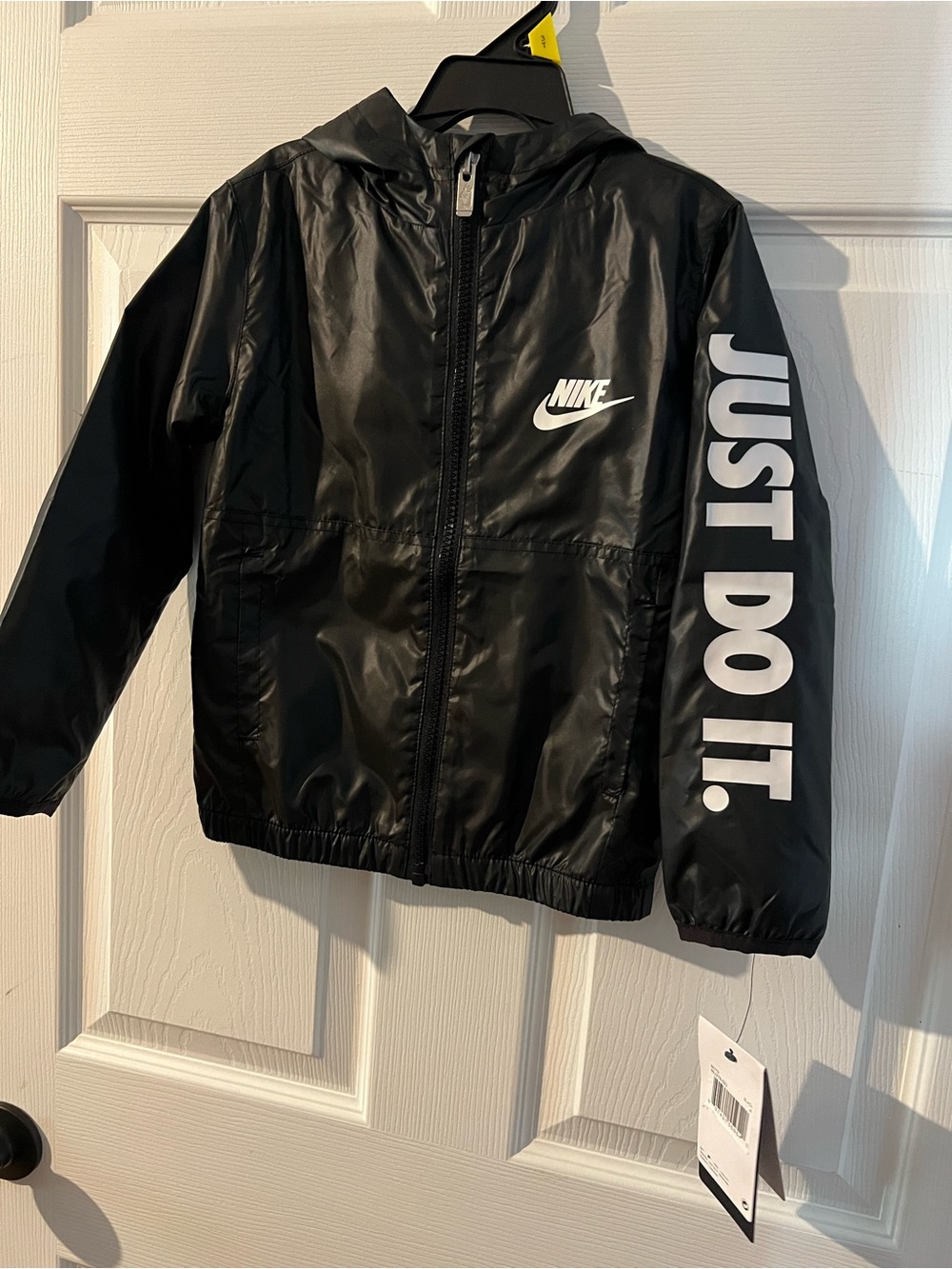 Nike Black Kids' Hooded Windbreaker with White 'Just Do It.' Sleeve Text